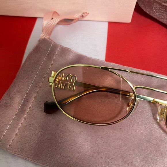 Miu Miu Gold Sunglasses with Amber Lenses main image 4